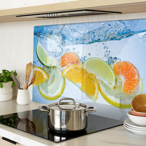 Chopping board glass Citrus fruits in water