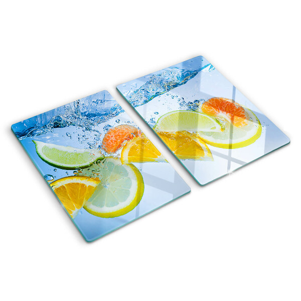 Chopping board glass Citrus fruits in water