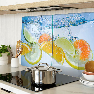 Chopping board glass Citrus fruits in water