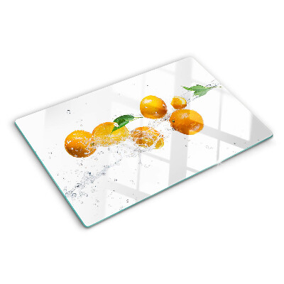 Chopping board glass Citrus fruits with water