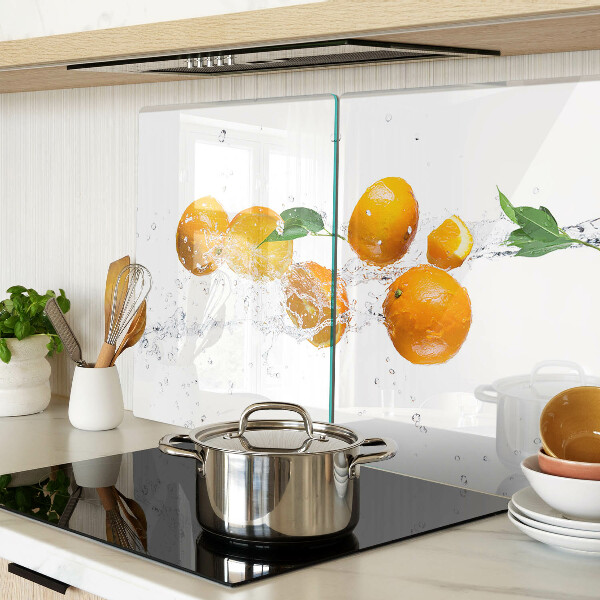 Chopping board glass Citrus fruits with water