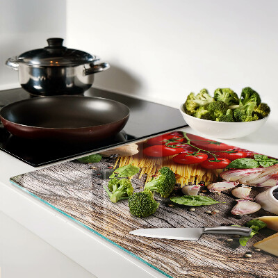 Chopping board Italian cuisine with pasta and vegetables