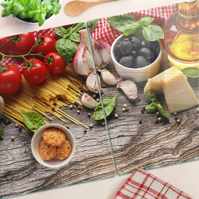 Chopping board Italian cuisine with pasta and vegetables