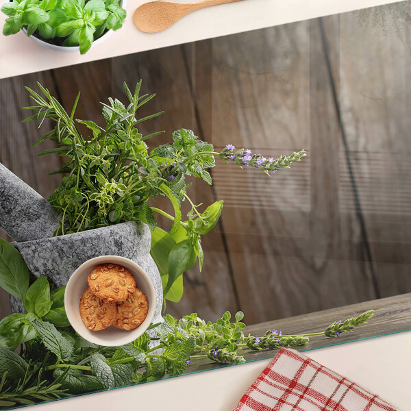 Chopping board glass Herbs in a pot
