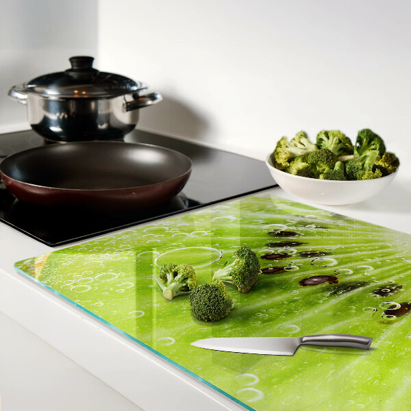 Chopping board glass Kiwi with drops of water