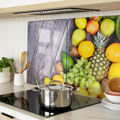 Cutting board Fruits on a wooden background