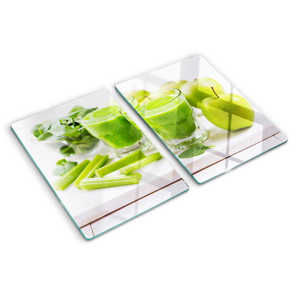 Glass chopping board Green smoothie with fresh ingredients