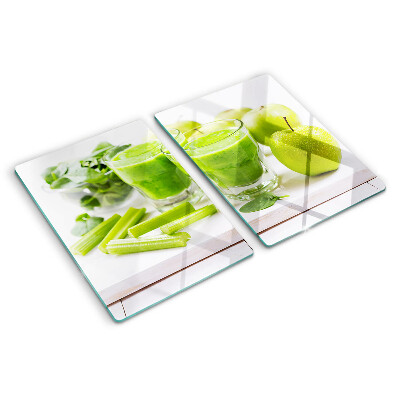 Glass chopping board Green smoothie with fresh ingredients