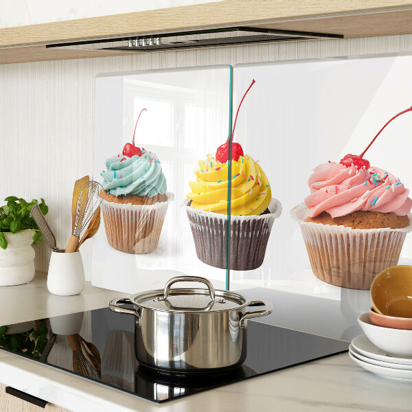 Chopping board glass Cupcake with whipped cream and cherry