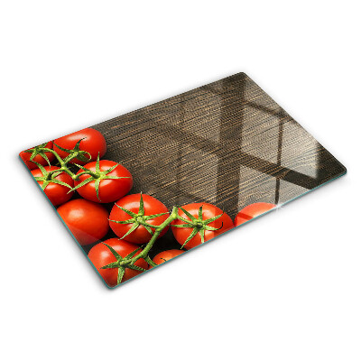 Cutting board Tomatoes on a wood background