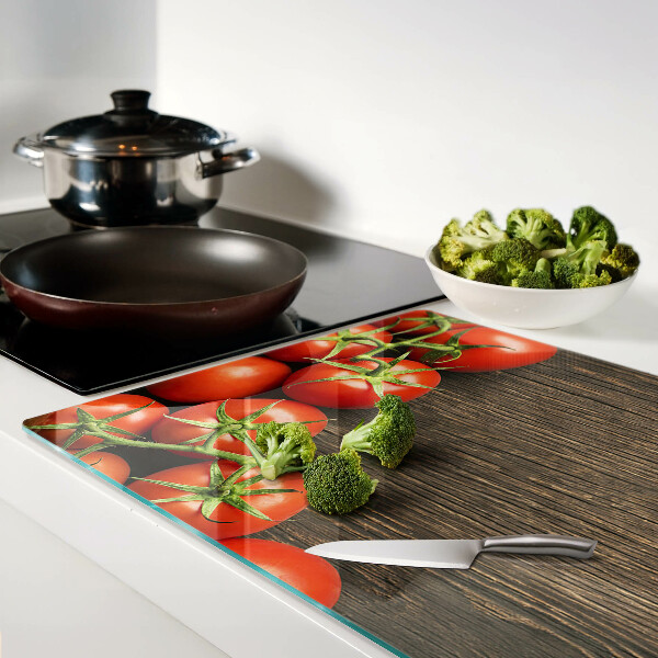Cutting board Tomatoes on a wood background