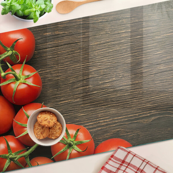 Cutting board Tomatoes on a wood background