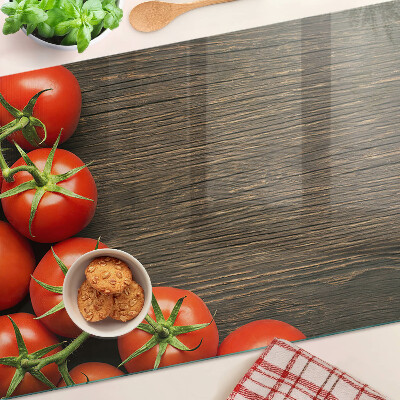 Cutting board Tomatoes on a wood background