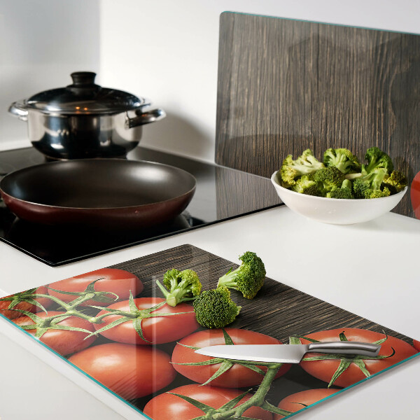 Cutting board Tomatoes on a wood background