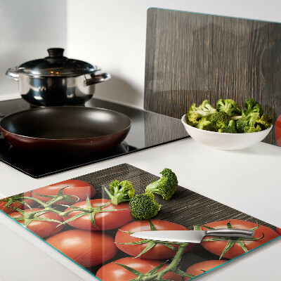 Cutting board Tomatoes on a wood background