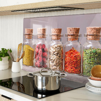 Glass chopping board Spices in glass jars