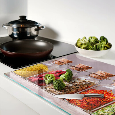 Glass chopping board Spices in glass jars