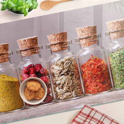 Glass chopping board Spices in glass jars