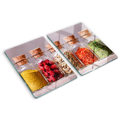 Glass chopping board Spices in glass jars