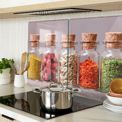 Glass chopping board Spices in glass jars