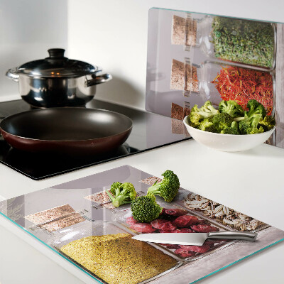 Glass chopping board Spices in glass jars