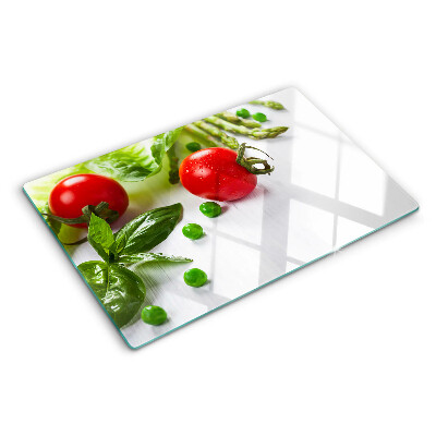 Cutting board Vegetables on a white countertop
