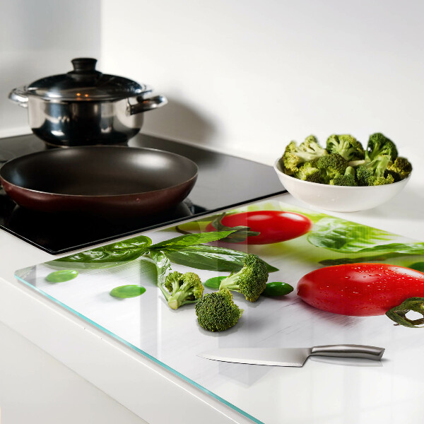 Cutting board Vegetables on a white countertop