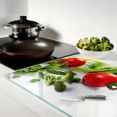 Cutting board Vegetables on a white countertop
