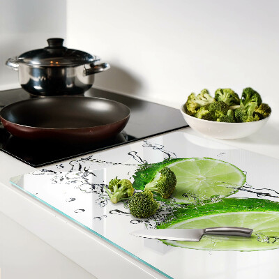 Glass chopping board Lemons in water