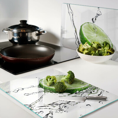 Glass chopping board Lemons in water