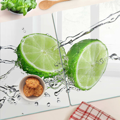 Glass chopping board Lemons in water