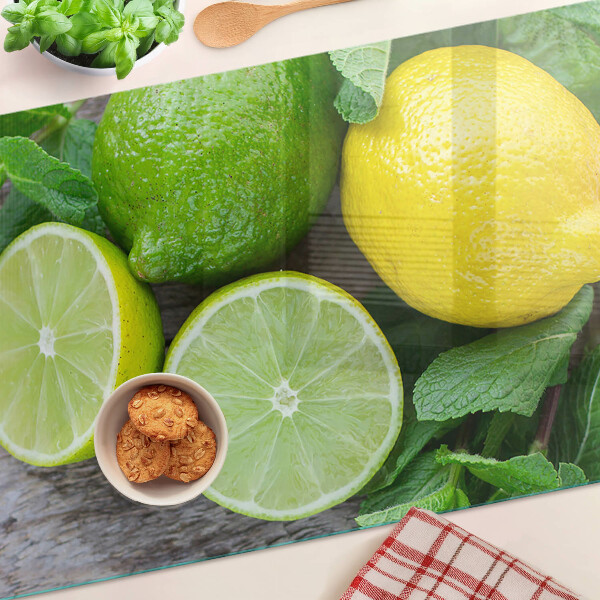 Chopping board Lemons and limes with mint