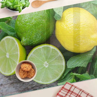 Chopping board Lemons and limes with mint