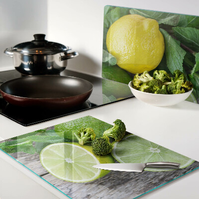 Chopping board Lemons and limes with mint