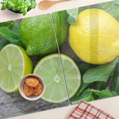 Chopping board Lemons and limes with mint