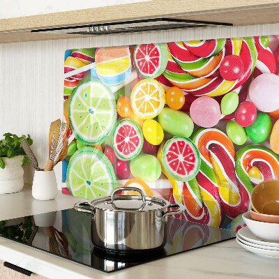 Glass cutting board Sweet candies and fruits