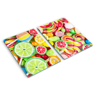 Glass cutting board Sweet candies and fruits