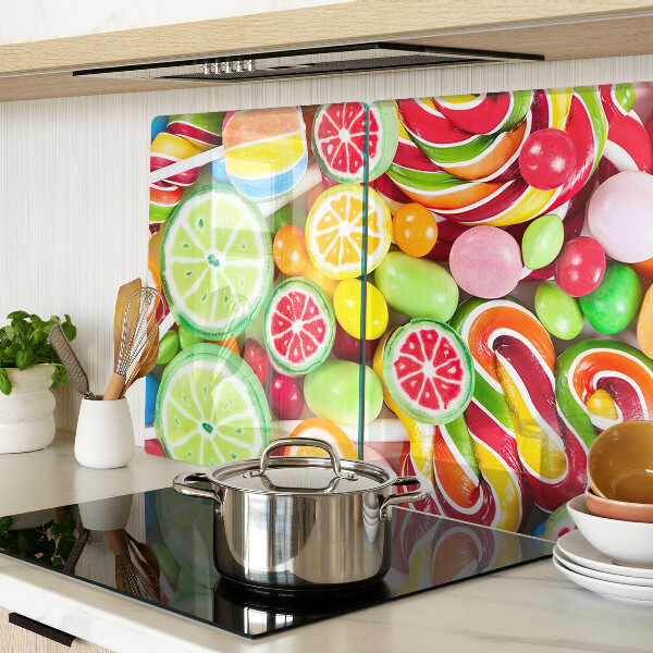 Glass cutting board Sweet candies and fruits