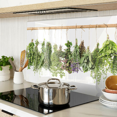 Glass chopping board Dried herbs on a string