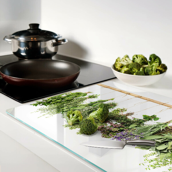 Glass chopping board Dried herbs on a string
