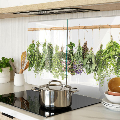 Glass chopping board Dried herbs on a string