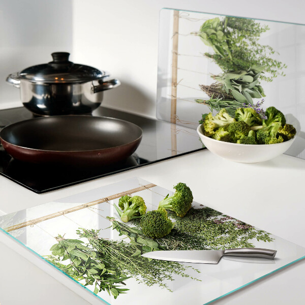 Glass chopping board Dried herbs on a string