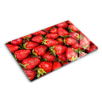 Cutting board Strawberries on a red background