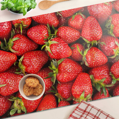 Cutting board Strawberries on a red background