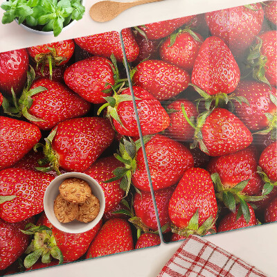 Cutting board Strawberries on a red background