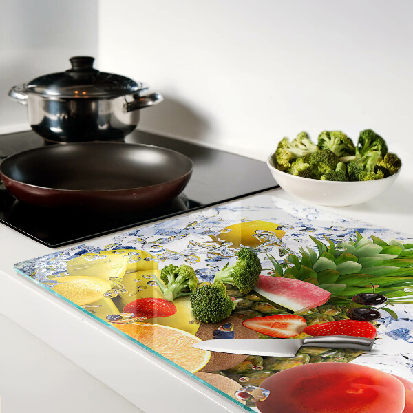 Glass chopping board Fruit in water