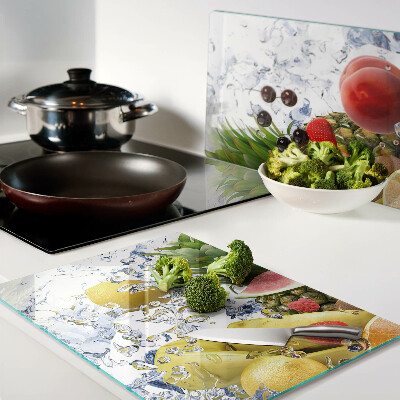 Glass chopping board Fruit in water