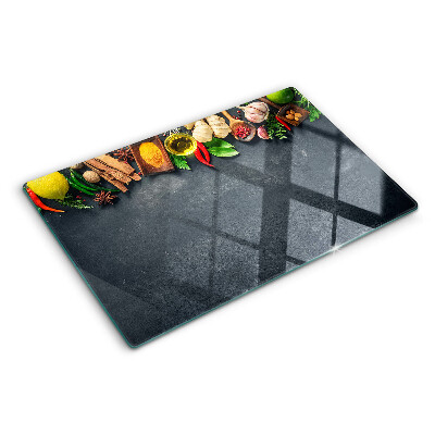 Glass kitchen board Kitchen spices and ingredients