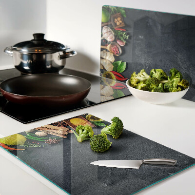 Glass kitchen board Kitchen spices and ingredients