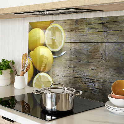 Cutting board Lemons on a wooden background